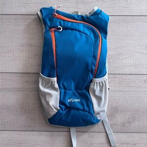 Blue Hydration Backpack with Orange Accents & Pockets Hiking & Cycling